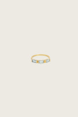 Anillo Faizi chapado en oro fino reciclado de 18K con topacio azul