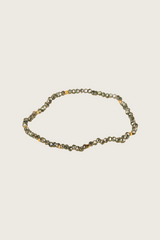 Pulsera Jaydu con incrustación de cristal verde en oro de 14 quilates